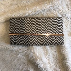 Textured clutch with removable strap